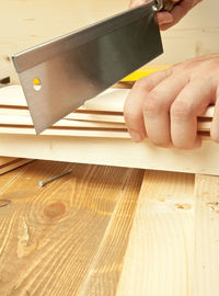 Close-up of man working on table