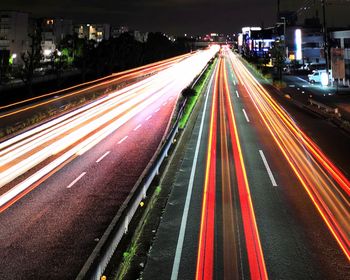 High angle view of light trails on city street