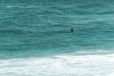 Man surfing in sea