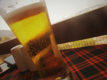 Close-up of beer in glass