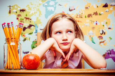 Close-up portrait of girl with ice cream