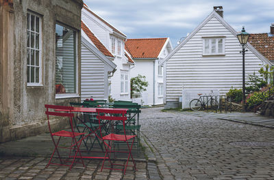 Empty chairs and tables in restaurant