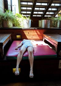 Low section of woman on table