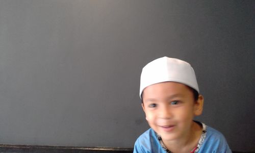 Close-up portrait of smiling boy