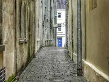 Narrow alley along buildings