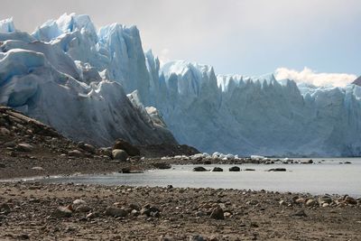 Scenic view of mountains against sky during winter