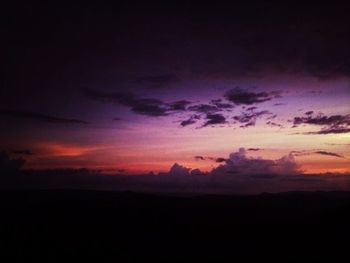 Scenic view of dramatic sky at sunset