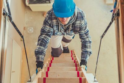 Low angle view of man at construction site