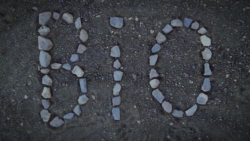 High angle view of stones on sand