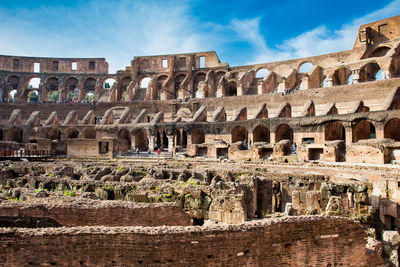 View of the seating areas and the hypogeum of the ancient colosseum in rome