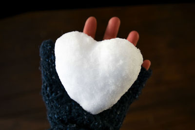 Close-up of hand holding ice cream