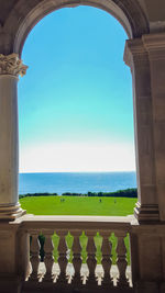 View of historical building against sea