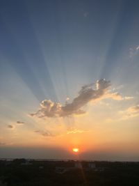 Sun shining over landscape