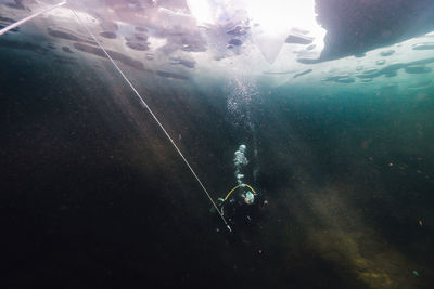 Man swimming in sea