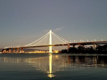 View of suspension bridge at night