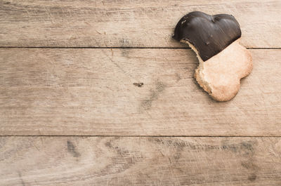 High angle view of biscuit on wooden table