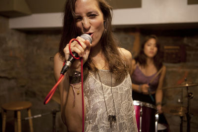 Young musicians practicing at a rehearsal space