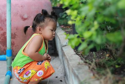 Portrait of cute girl looking away