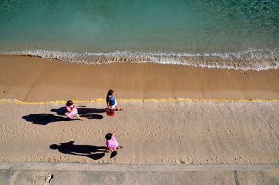 Full length of woman standing on beach