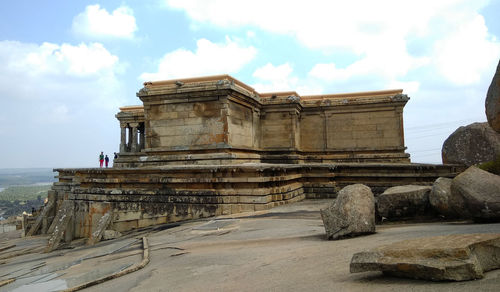 View of temple against cloudy sky