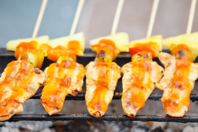 Close-up of meat on barbecue grill