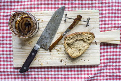 High angle view of bread on cutting board