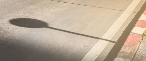 High angle view of shadow on ground