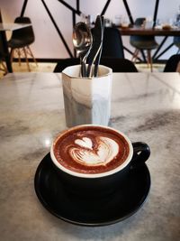 Coffee cup on table