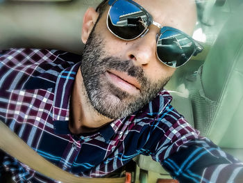 Portrait of young man wearing sunglasses