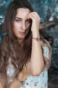 Portrait of woman standing outdoors