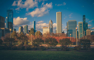 Buildings in city against sky