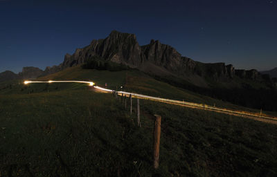 Mountain against clear sky at night