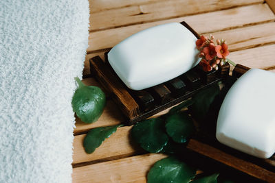 Close-up of soap on wooden floor