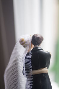 Close-up of couple figurines