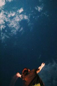 Close-up of woman against sky