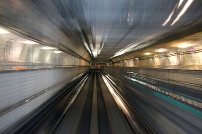 Blurred motion of railroad tracks at subway station