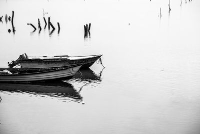 Boat moored in river