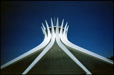 Low angle view of built structure against blue sky