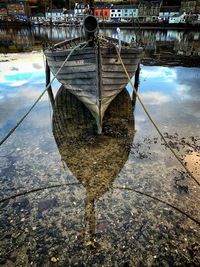 Fishing boat moored at pier