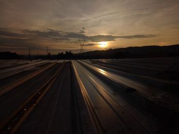 Road against sky during sunset