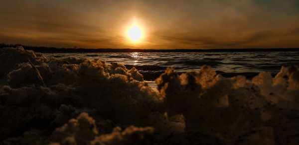 Scenic view of sea against sky during sunset