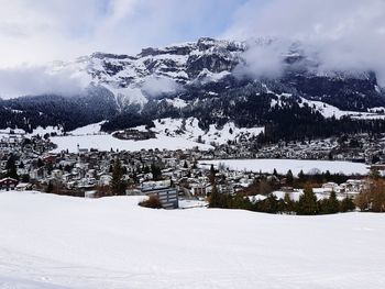 Snow covered mountains against sky