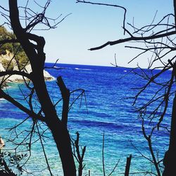 Scenic shot of calm sea against clear sky