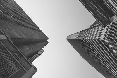 Low angle view of modern buildings against clear sky