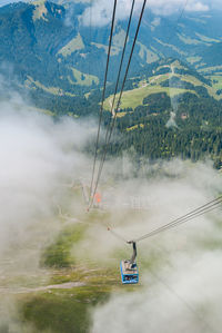 High angle view of overhead cable car over mountains