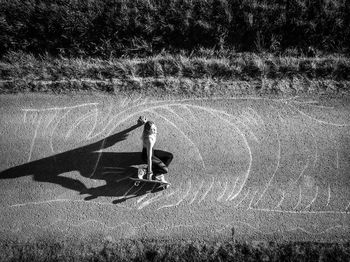 Shadow of man on field