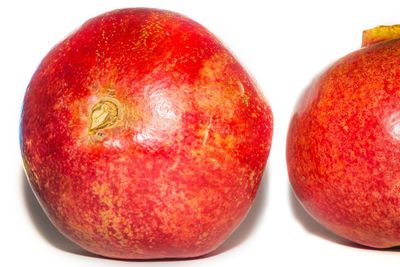 Close-up of apple against white background