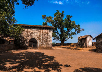 View of old building against blue sky