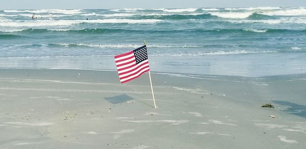 Flag on beach