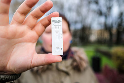 Close-up of hand holding pcr device